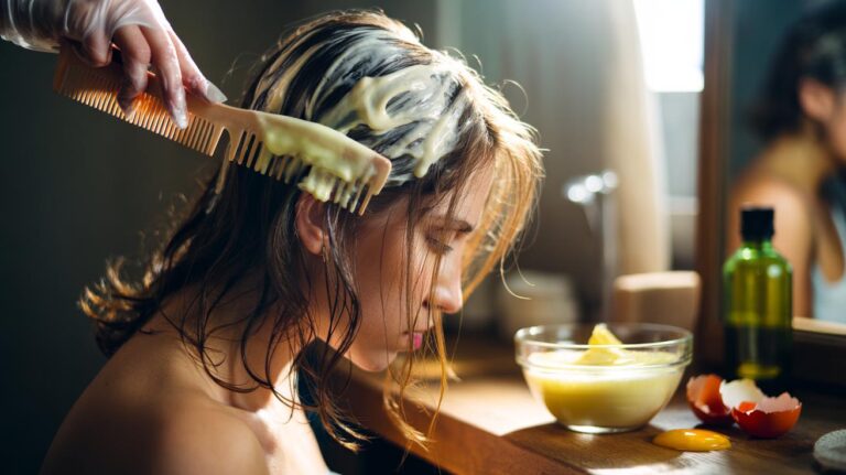 Illustration of a mayonnaise hair mask, made from oils and eggs, being applied to dry hair to coat strands like a conditioner